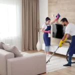 A uniformed and vetted professional from a licensed house cleaning service in Gibraltar entering a luxury apartment. about how to choose house cleaning company in Gibraltar