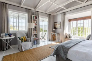 Professional Airbnb & short-term rental cleaning team in Gibraltar staging a luxury bedroom for the next guest.