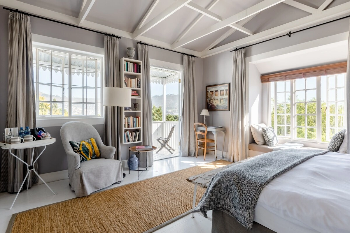 Professional Airbnb & short-term rental cleaning team in Gibraltar staging a luxury bedroom for the next guest.