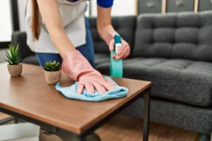 Vetted professionals executing a cleaning checklist for a standard home cleaning service in a Gibraltar apartment.